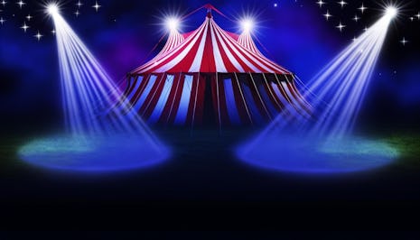 A circus tent with spotlights.